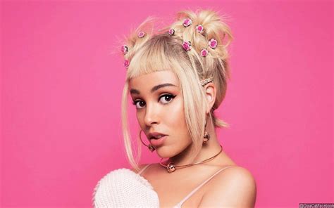 doja cat titties|Doja Cat displays the results of her recent breast reduction